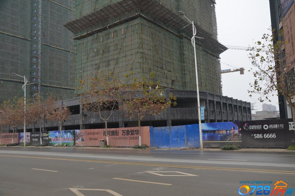 唐街西湖一号12月工程进度1#楼底临街商铺外立面完工