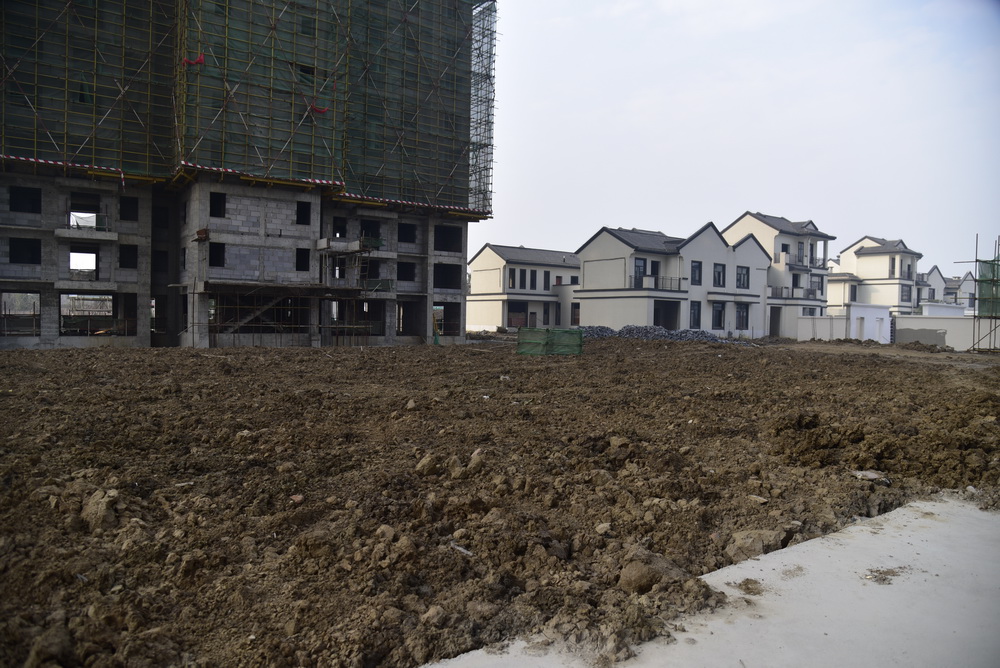 鑫龙·御龙湾2020年12月工程进度1-3号楼中间的地面正在回填
